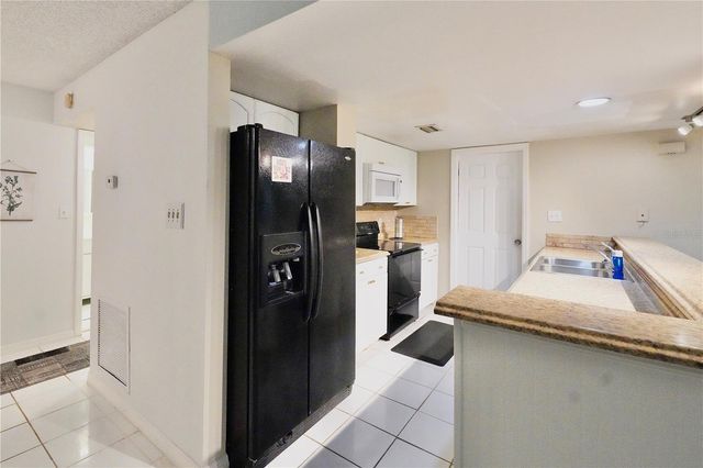 2511 2511 DOLLY BAY DRIVE 102, Palm Harbor, FL 34684