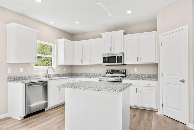 703 Wood Sage Court, Raymore, MO 64083