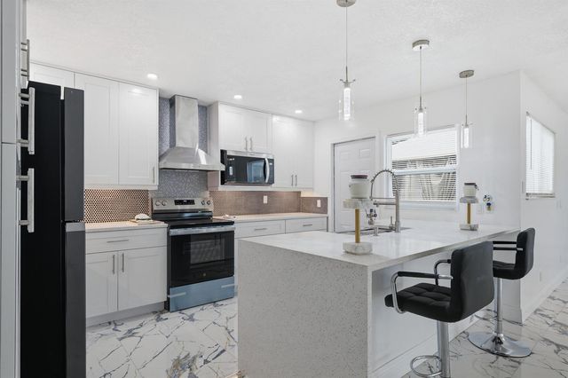 1051 SW Dubois Avenue, Port St. Lucie, FL 34953