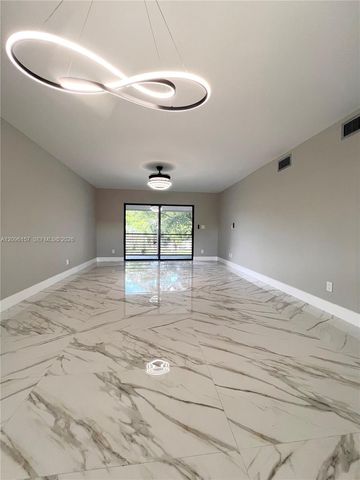 4940 E Sabal Palm Boulevard 312, Tamarac, FL 33319