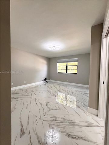 4940 E Sabal Palm Boulevard 312, Tamarac, FL 33319