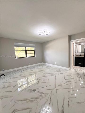 4940 E Sabal Palm Boulevard 312, Tamarac, FL 33319