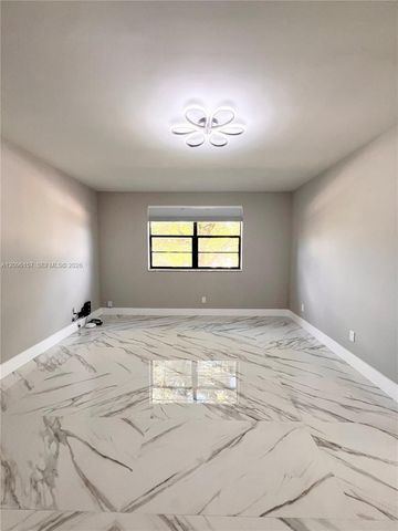 4940 E Sabal Palm Boulevard 312, Tamarac, FL 33319