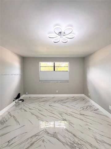 4940 E Sabal Palm Boulevard 312, Tamarac, FL 33319