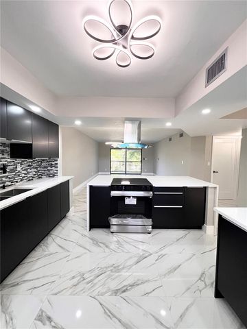 4940 E Sabal Palm Boulevard 312, Tamarac, FL 33319