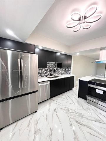 4940 E Sabal Palm Boulevard 312, Tamarac, FL 33319