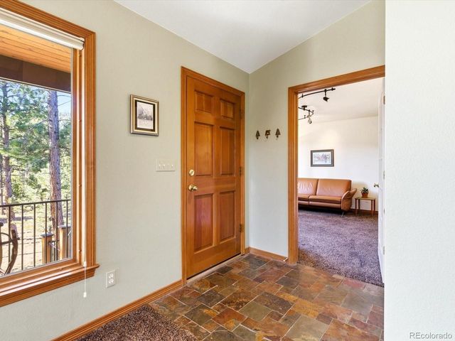 30819 Manitoba Dr, Evergreen, CO 80439