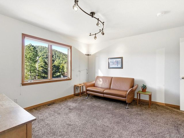 30819 Manitoba Dr, Evergreen, CO 80439