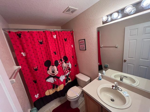 141 LA MIRAGE STREET, Davenport, FL 33897