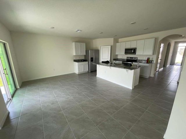 8954 FORGE BREEZE LOOP, Wesley Chapel, FL 33545