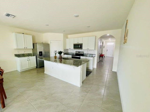 8954 FORGE BREEZE LOOP, Wesley Chapel, FL 33545