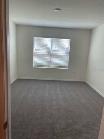 8954 FORGE BREEZE LOOP, Wesley Chapel, FL 33545