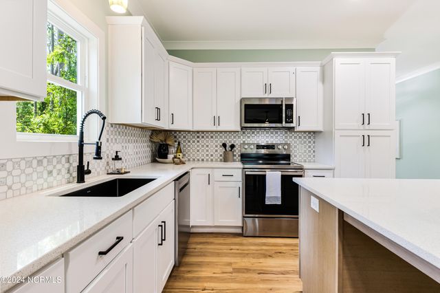 230 NE 74th Street, Oak Island, NC 28465