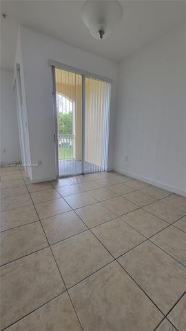 10012 NW 7th St 209, Miami, FL 33172