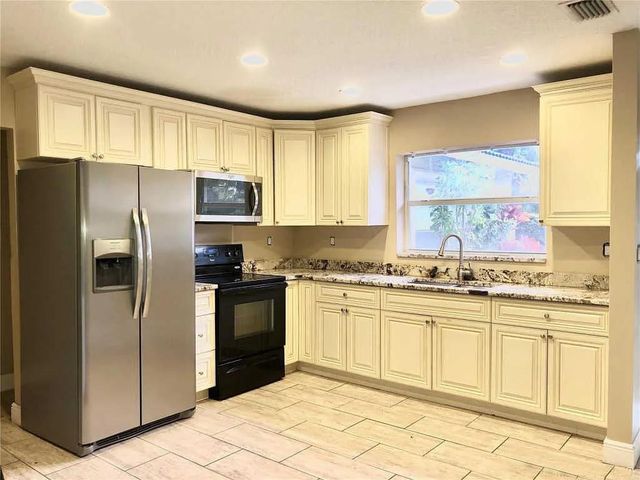 3502 Riverside Drive, Coral Springs, FL 33065