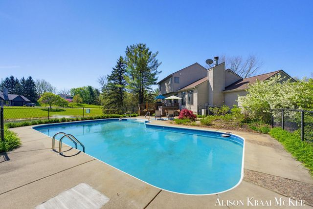 100 Rollingbrook NE, Ada, MI 49301