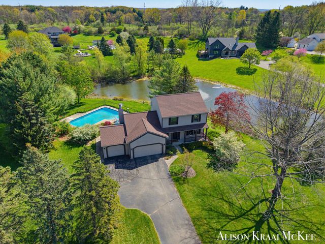 100 Rollingbrook NE, Ada, MI 49301