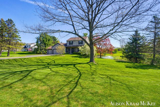 100 Rollingbrook NE, Ada, MI 49301