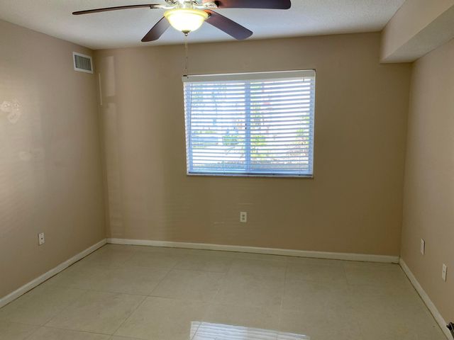 3481 Briar Bay Boulevard 103, West Palm Beach, FL 33411