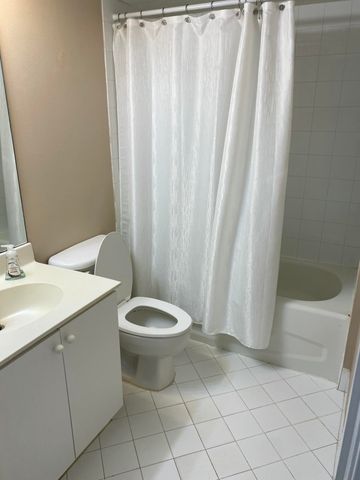 3481 Briar Bay Boulevard 103, West Palm Beach, FL 33411