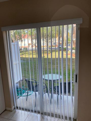 3481 Briar Bay Boulevard 103, West Palm Beach, FL 33411