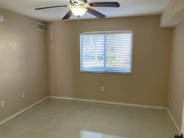 3481 Briar Bay Boulevard 103, West Palm Beach, FL 33411