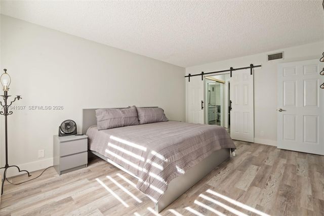 301 Racquet Club Rd 104, Weston, FL 33326