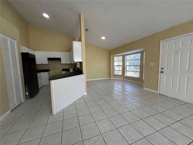 3933 MAGNOLIA LAKE LANE, Orlando, FL 32810