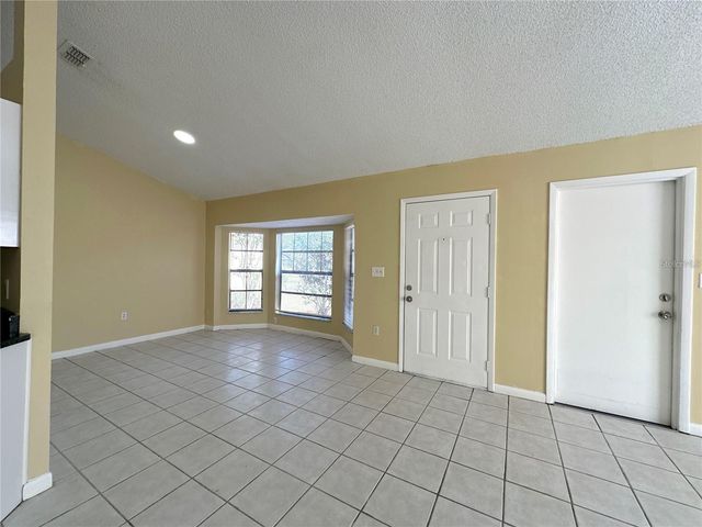 3933 MAGNOLIA LAKE LANE, Orlando, FL 32810