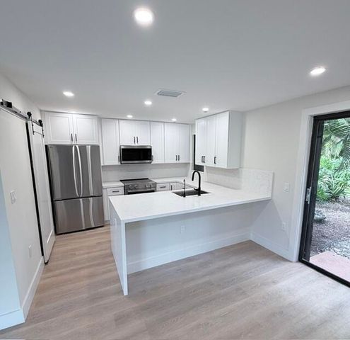 7094 Rain Forest Drive H-7-l, Boca Raton, FL 33434