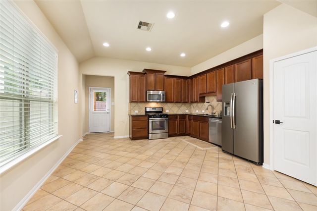 9420 Savannah Holly Drive, Houston, TX 77075