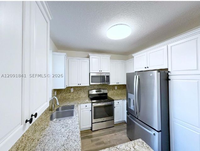 202 Riverwalk Cir, Sunrise, FL 33326