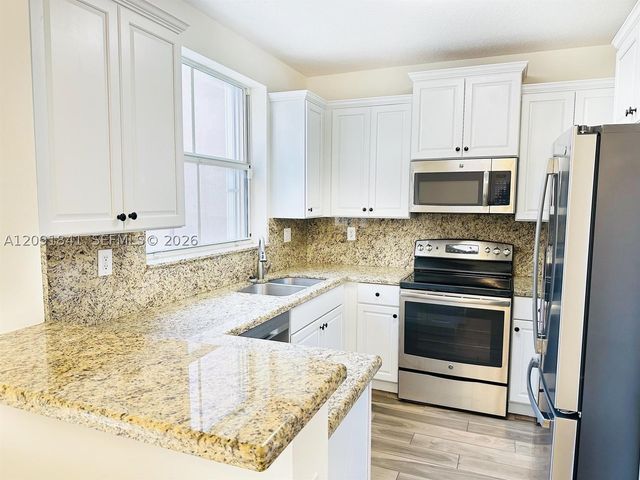 202 Riverwalk Cir, Sunrise, FL 33326