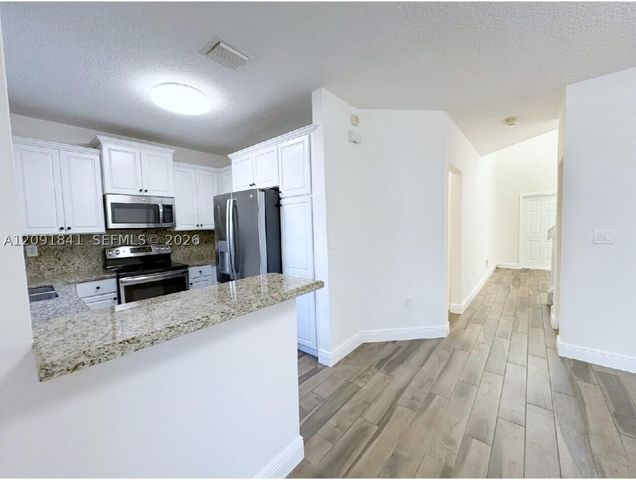 202 Riverwalk Cir, Sunrise, FL 33326