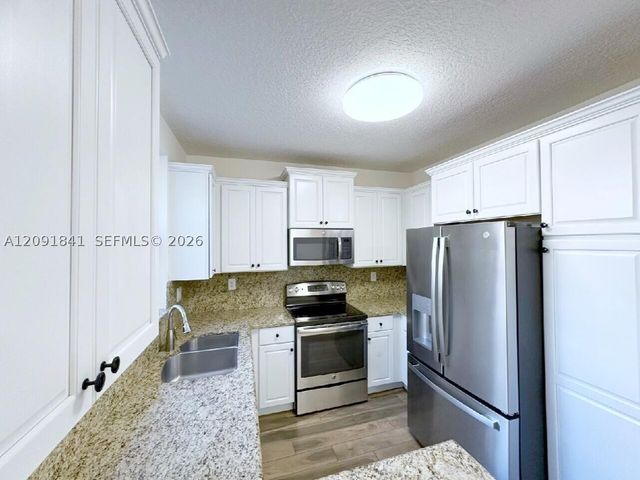 202 Riverwalk Cir, Sunrise, FL 33326