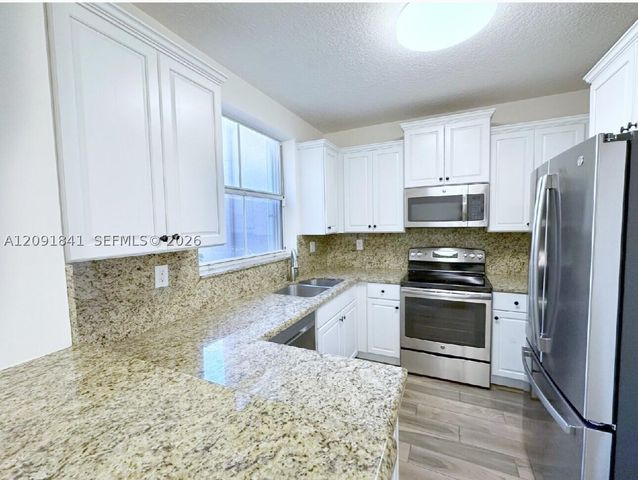 202 Riverwalk Cir, Sunrise, FL 33326