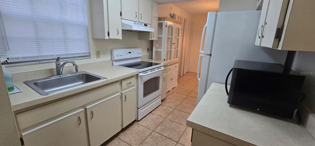 7912 MIDWAY DRIVE TERRACE T101, Ocala, FL 34472