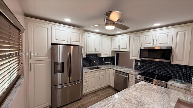 6090 N Sabal Palm Blvd 311, Tamarac, FL 33319