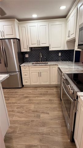 6090 N Sabal Palm Blvd 311, Tamarac, FL 33319