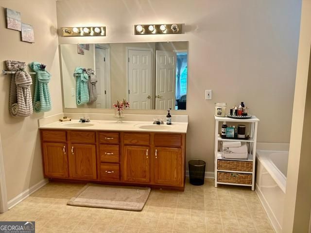 4112 Medlock River Court, Snellville, GA 30039