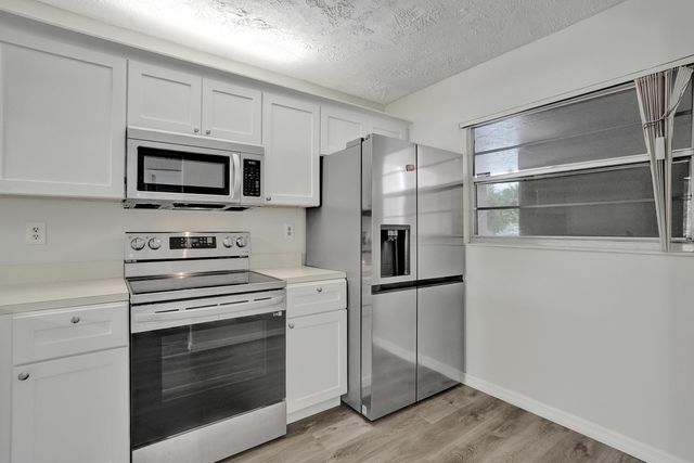 1920 SABAL PALM Drive 203, Davie, FL 33324