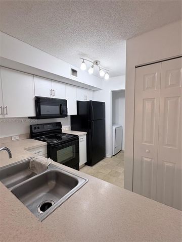 11177 SW 8th St 108, Pembroke Pines, FL 33025