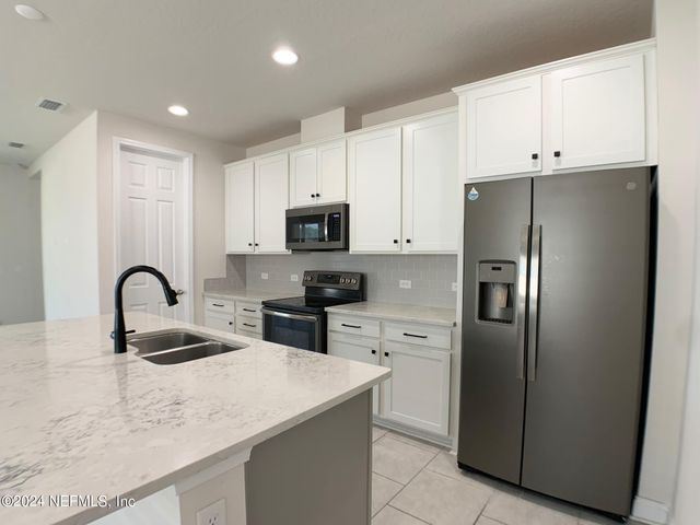 1499 TROPICAL PINE Cove, Middleburg, FL 32068