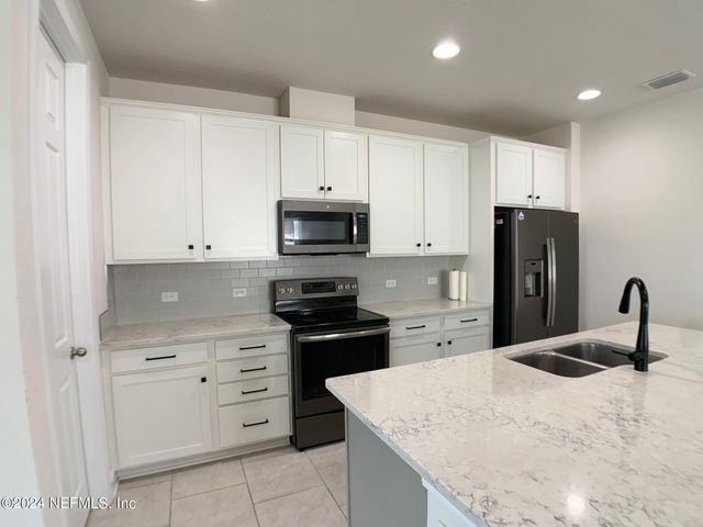 1499 TROPICAL PINE Cove, Middleburg, FL 32068