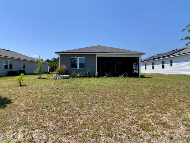1499 TROPICAL PINE Cove, Middleburg, FL 32068