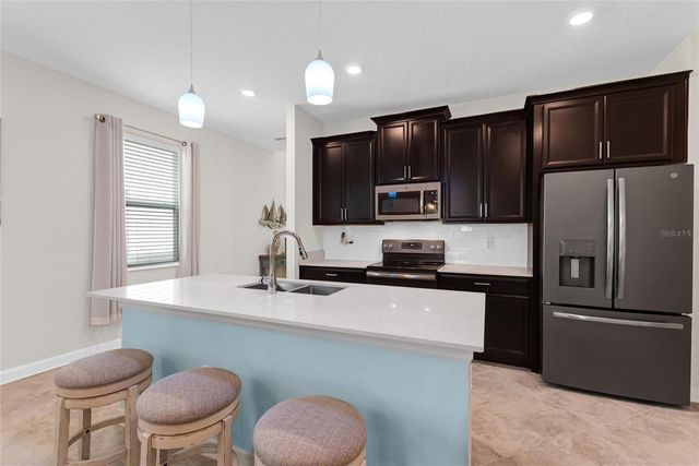 1045 BLACKWOLF RUN RD, Davenport, FL 33896