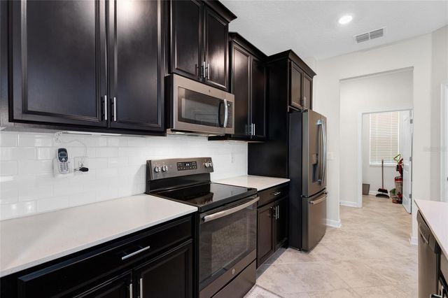 1045 BLACKWOLF RUN RD, Davenport, FL 33896
