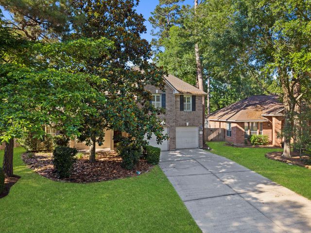 78 E Hobbit Glen Drive, Conroe, TX 77384