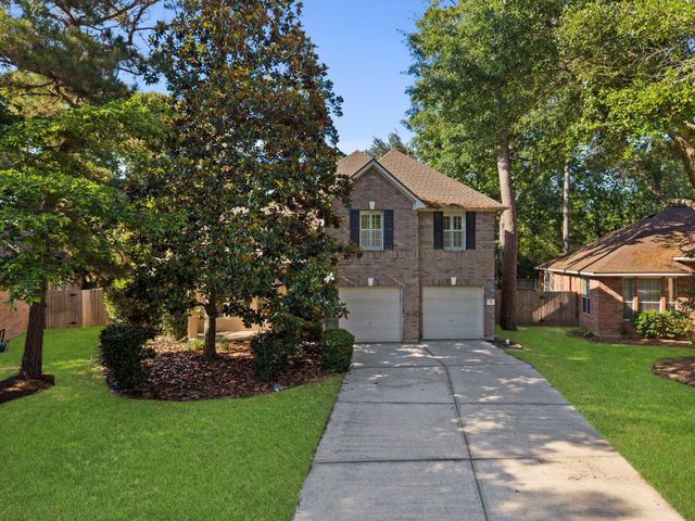 78 E Hobbit Glen Drive, Conroe, TX 77384
