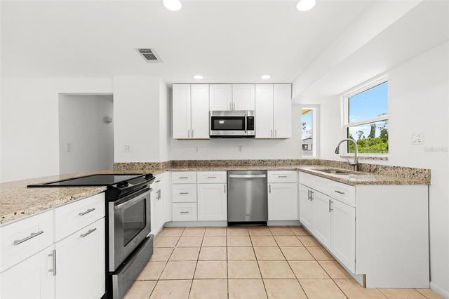 1057 TROPICAL AVENUE NW, Port Charlotte, FL 33948